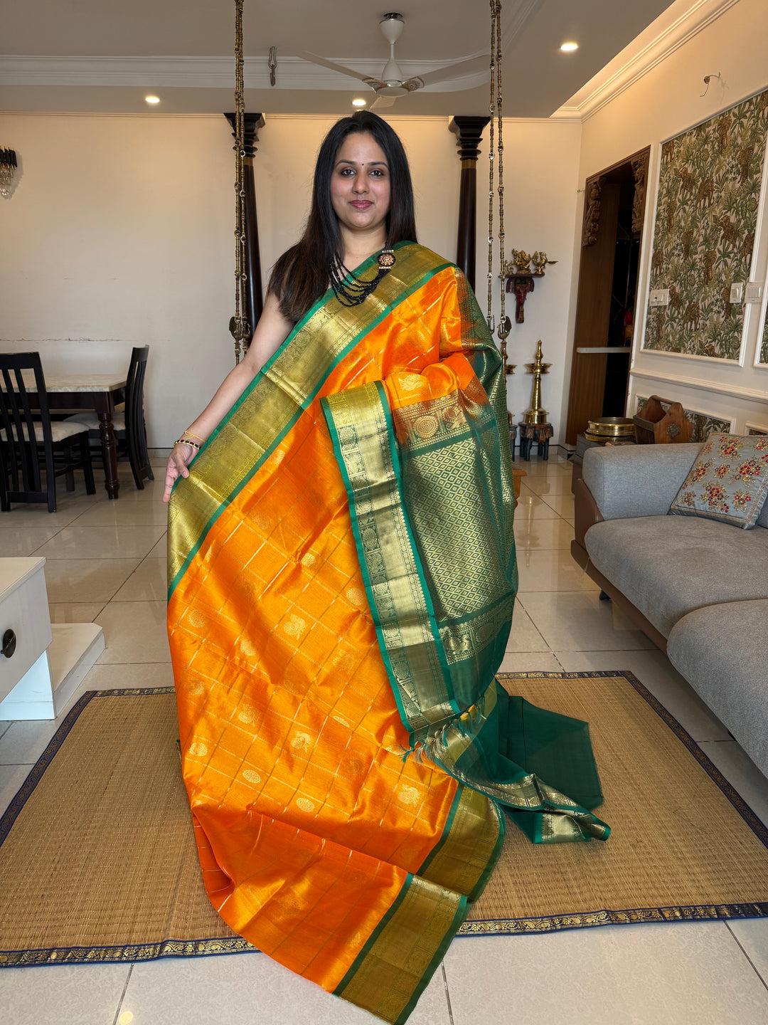Mambazha Manjal with Green  , zari kattam in the body with Mayil and Chakram butta ,traditional borders and rich Pallu Silk Cotton Saree