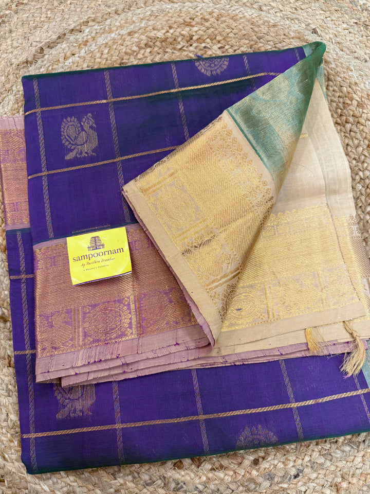 Double shaded Purple with Biscuit colour  , zari kattam in the body with Mayil and Chakram butta ,traditional borders and rich Pallu Silk Cotton Saree