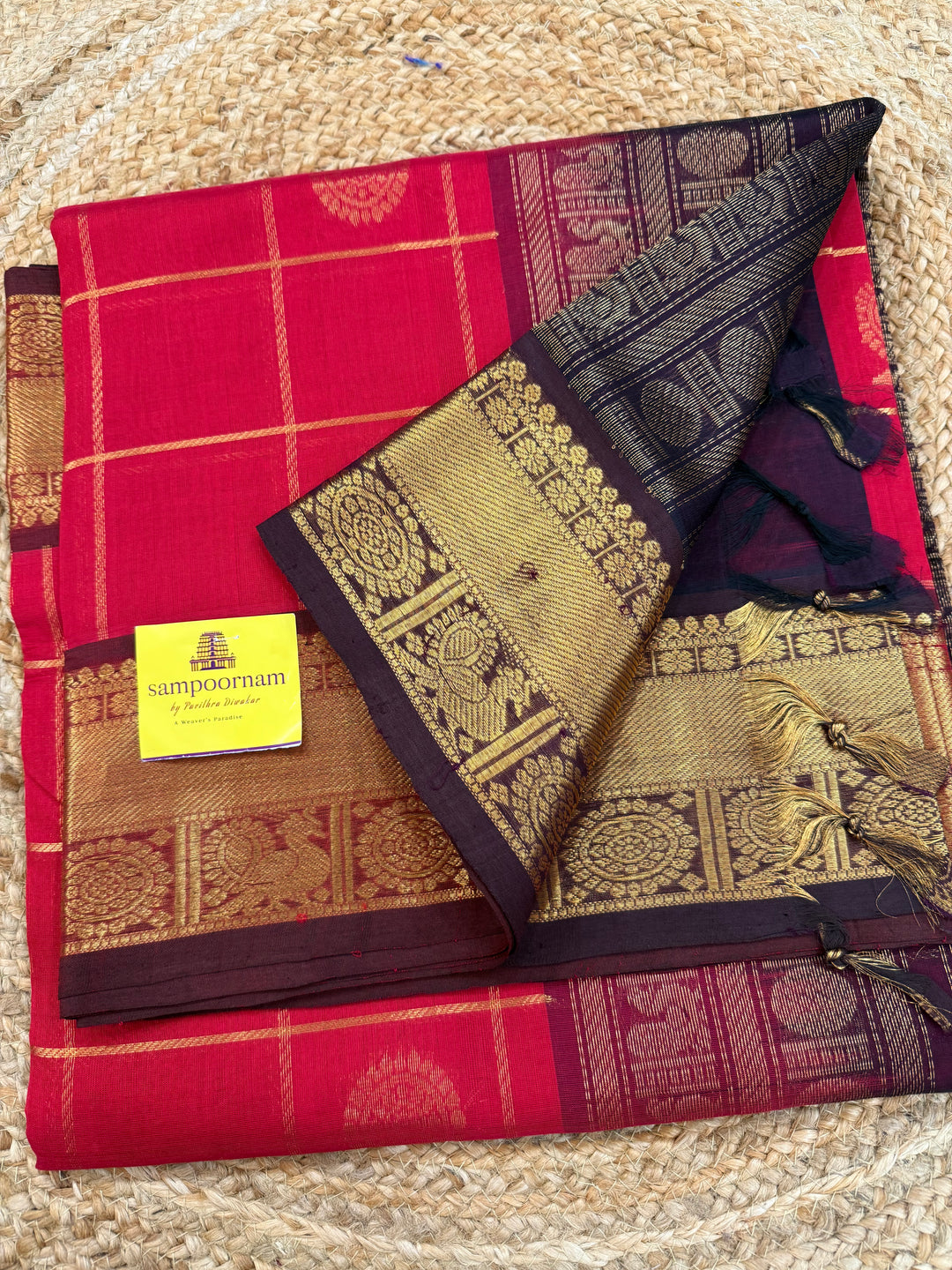 Red With  Brown  , zari kattam in the body with Mayil and Chakram butta ,traditional borders and rich Pallu Silk Cotton Saree