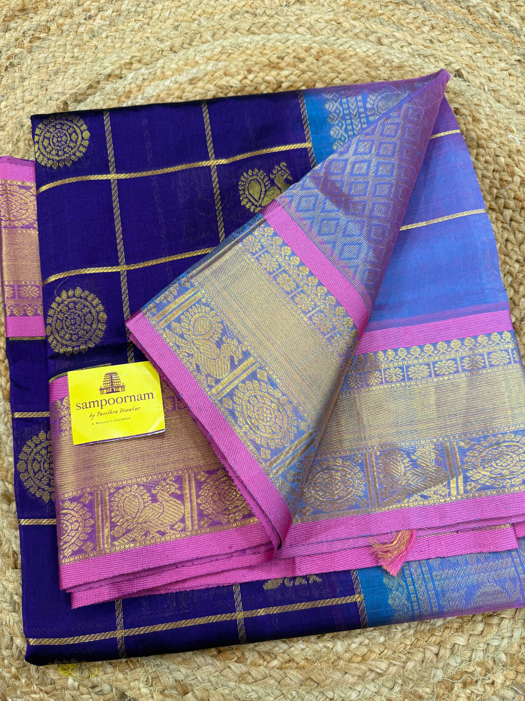 Purple with Blueish Pink colour ,Baby Pink selvedge ,zari kattam in the body with Mayil and Chakram butta ,traditional borders and rich Pallu Silk Cotton Saree