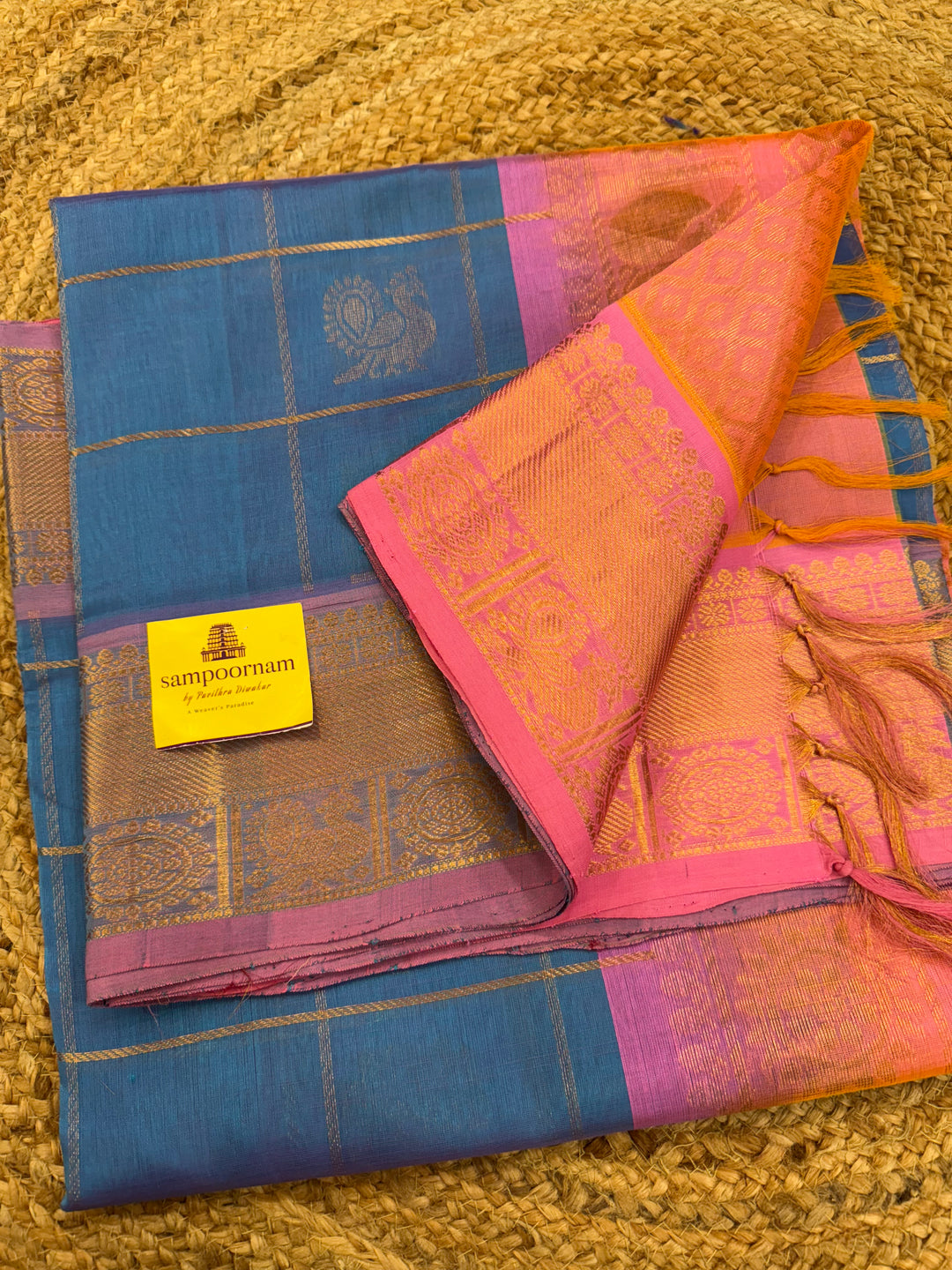 Pastel Blue with Baby Pink colour , zari kattam in the body with Mayil and Chakram butta ,traditional borders and rich Pallu Silk Cotton Saree