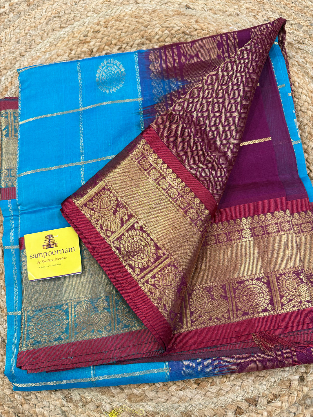 Ramar Blue with Maroon colour , zari kattam in the body with Mayil and Chakram butta ,traditional borders and rich Pallu Silk Cotton Saree