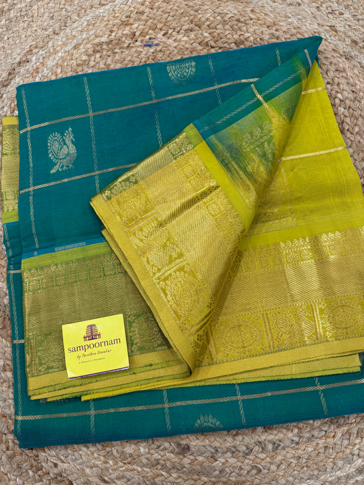 Rexona Green with Lemon Yellow colour , zari kattam in the body with Mayil and Chakram butta ,traditional borders and rich Pallu Silk Cotton Saree