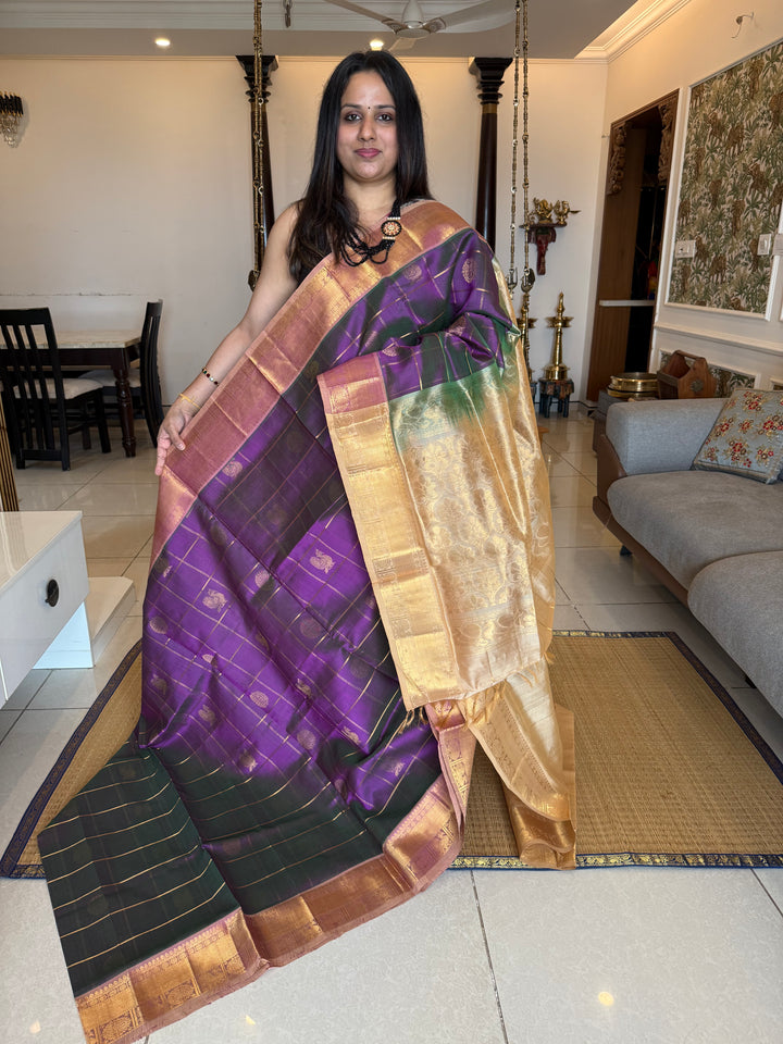 Double shaded Purple with Biscuit colour  , zari kattam in the body with Mayil and Chakram butta ,traditional borders and rich Pallu Silk Cotton Saree