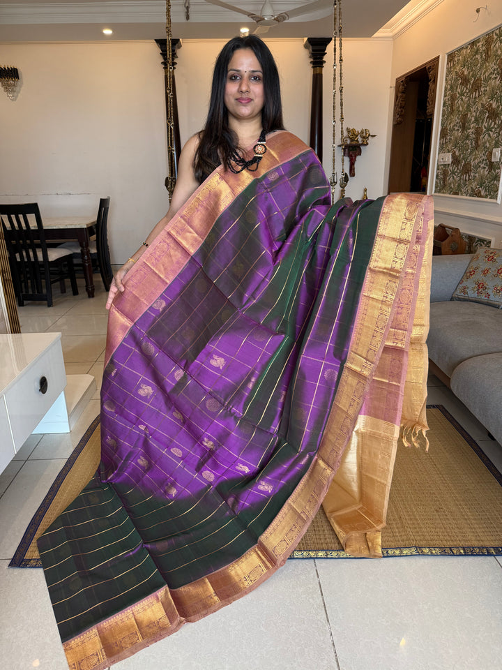Double shaded Purple with Biscuit colour  , zari kattam in the body with Mayil and Chakram butta ,traditional borders and rich Pallu Silk Cotton Saree