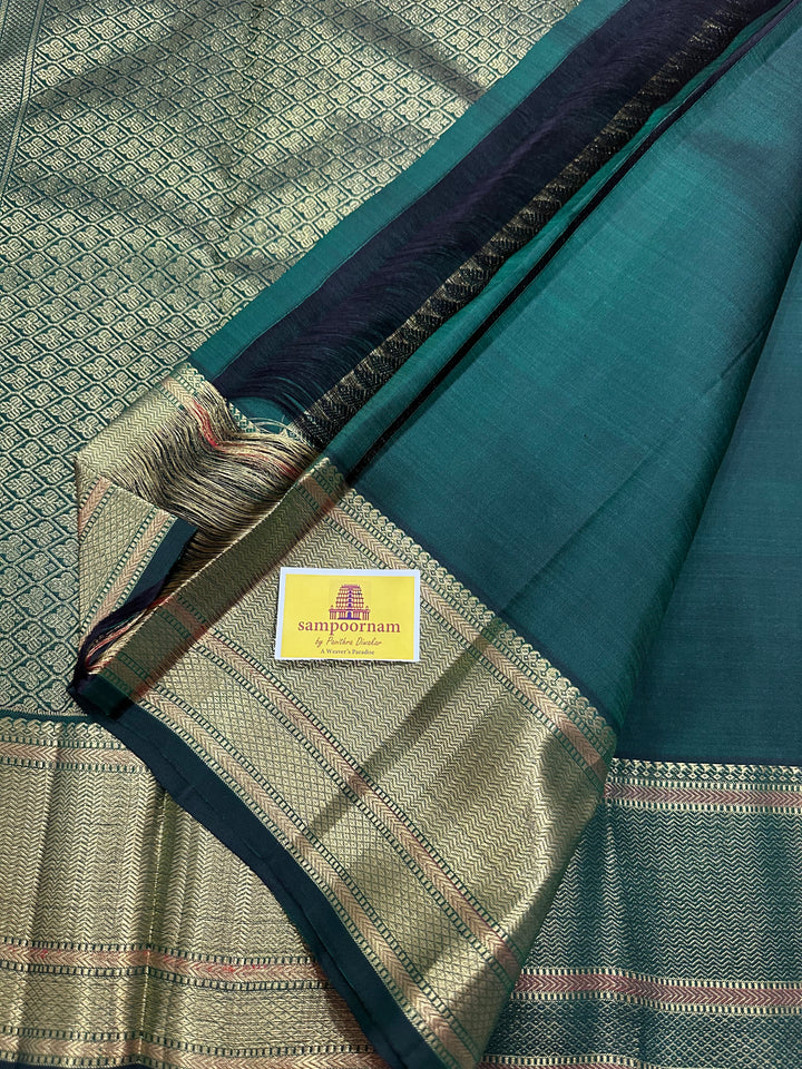 Dark Green with Zari Butta all over the Body Rich Border And Pallu Pure Kanjivaram Silk Saree