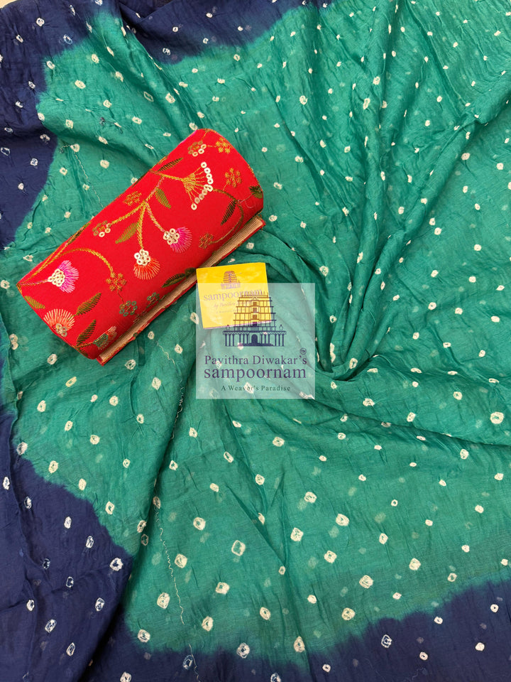 Cotton - Blue with Green, Bandhini Prints in the top ,dupatta and bottom Salwar Material