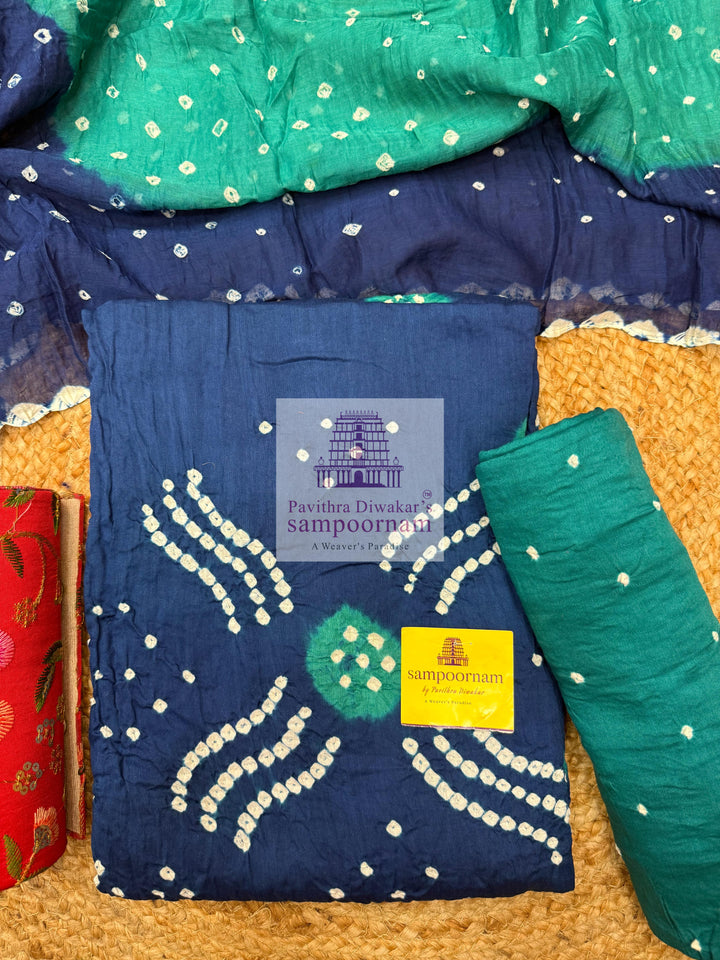 Cotton - Blue with Green, Bandhini Prints in the top ,dupatta and bottom Salwar Material