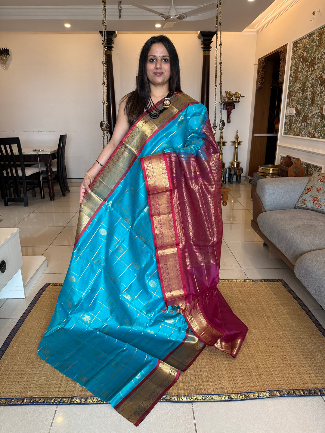 Ramar Blue with Maroon colour , zari kattam in the body with Mayil and Chakram butta ,traditional borders and rich Pallu Silk Cotton Saree