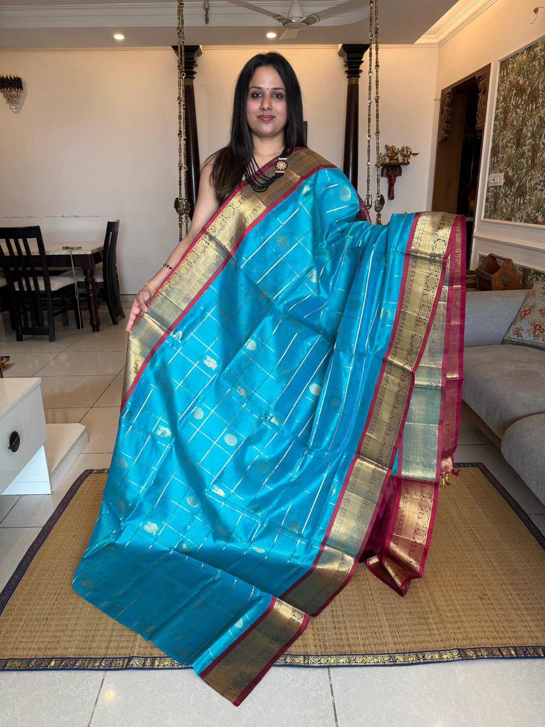 Ramar Blue with Maroon colour , zari kattam in the body with Mayil and Chakram butta ,traditional borders and rich Pallu Silk Cotton Saree