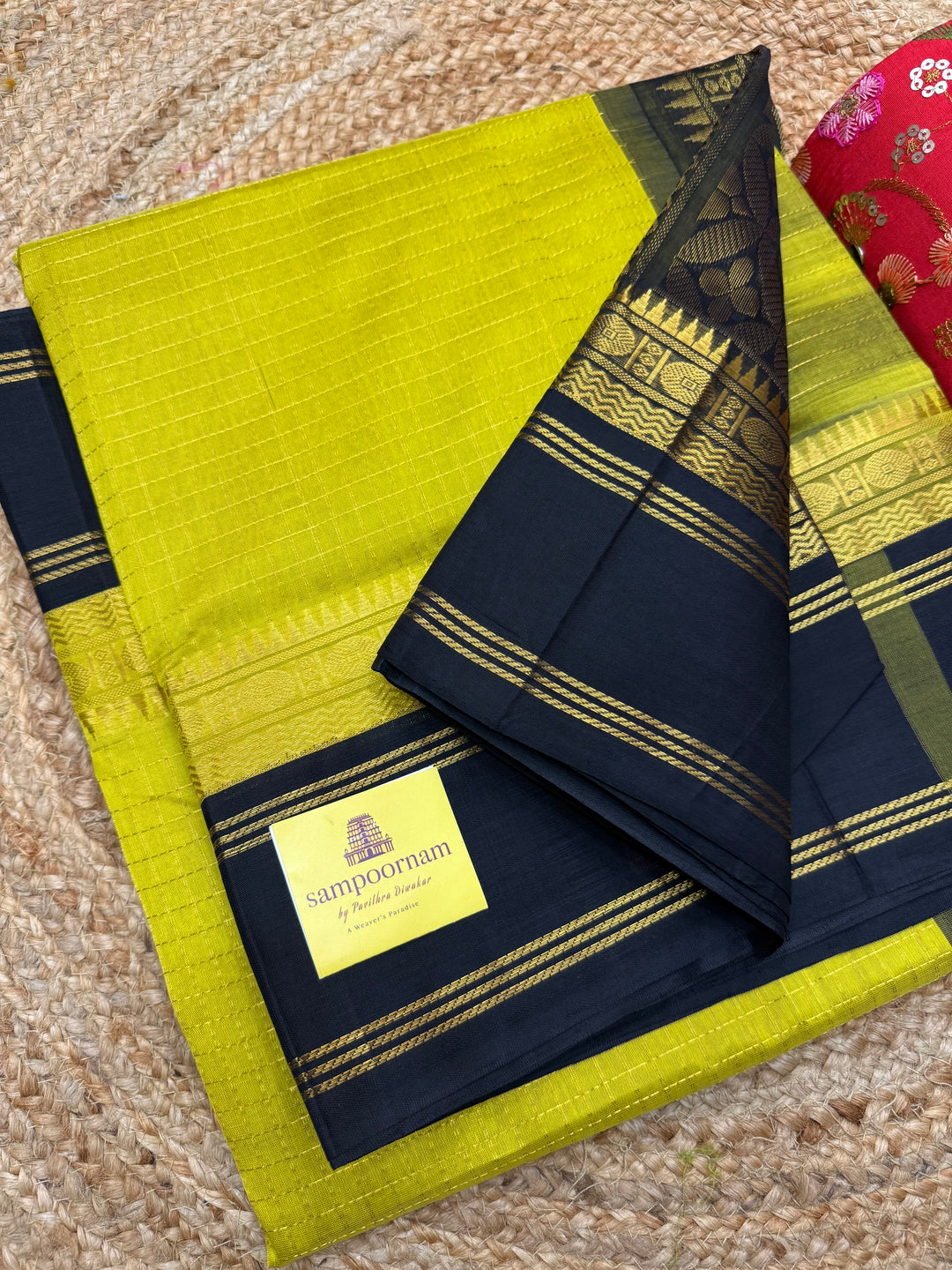 Lemon Yellow with Black , Rich Zari checks in the body , rettapet borders and rich Pallu Korvai Silk Cotton Saree