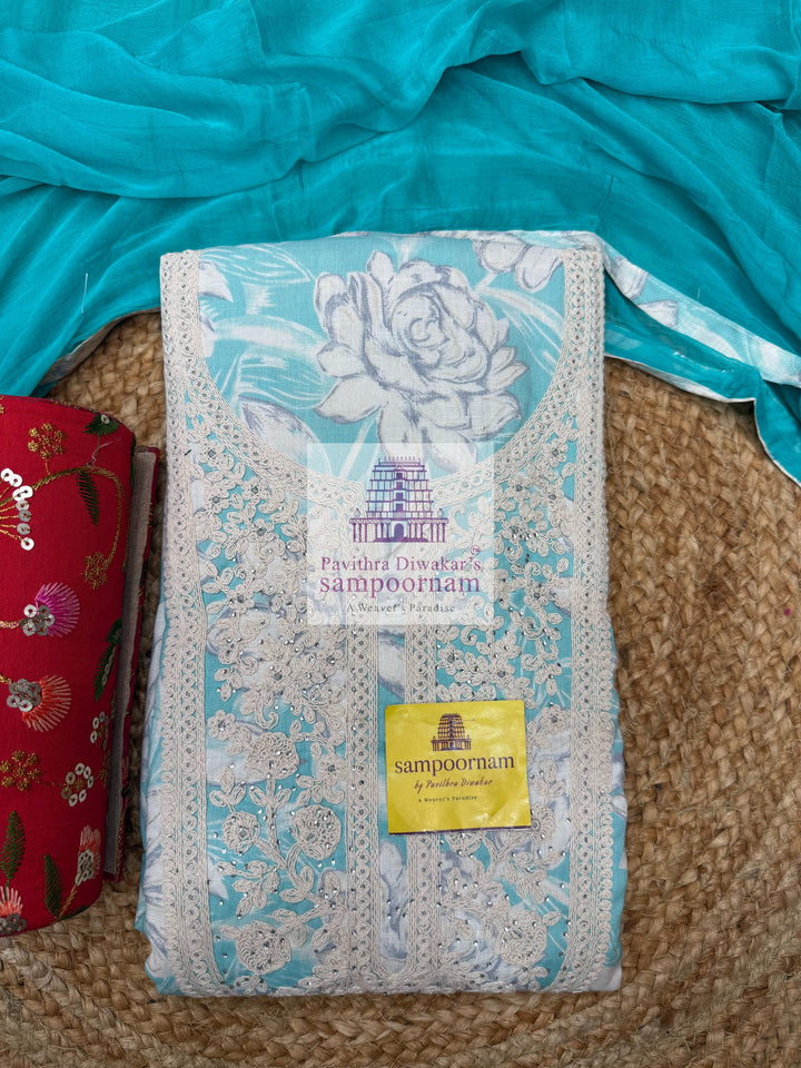 Blue Top with Floral Prints and Thread Embroidery in the Yoke and Blue bottom with Chiffon Plain Dupatta - Cotton Salwar Material