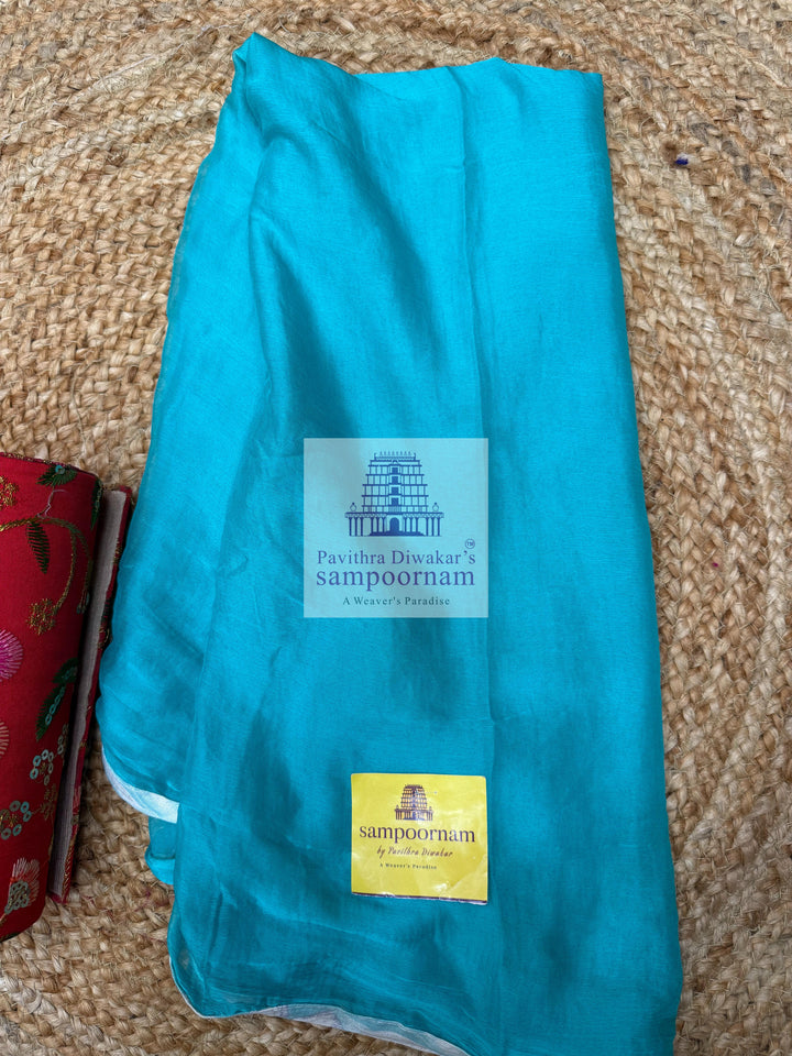 Blue Top with Floral Prints and Thread Embroidery in the Yoke and Blue bottom with Chiffon Plain Dupatta - Cotton Salwar Material