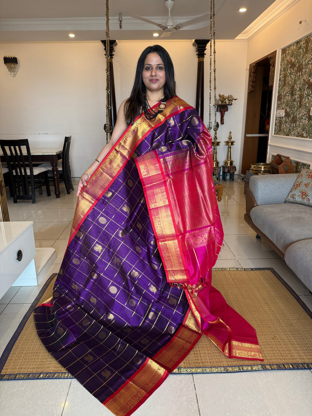 Purple with Pink , Red Selvedge  , zari kattam in the body with Mayil and Chakram butta ,traditional borders and rich Pallu Silk Cotton Saree
