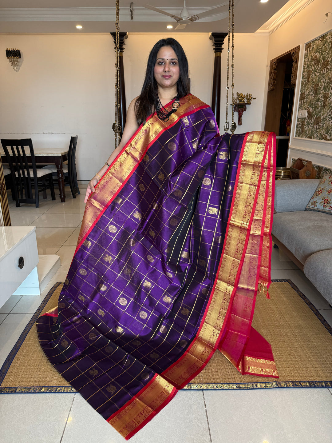 Purple with Pink , Red Selvedge  , zari kattam in the body with Mayil and Chakram butta ,traditional borders and rich Pallu Silk Cotton Saree