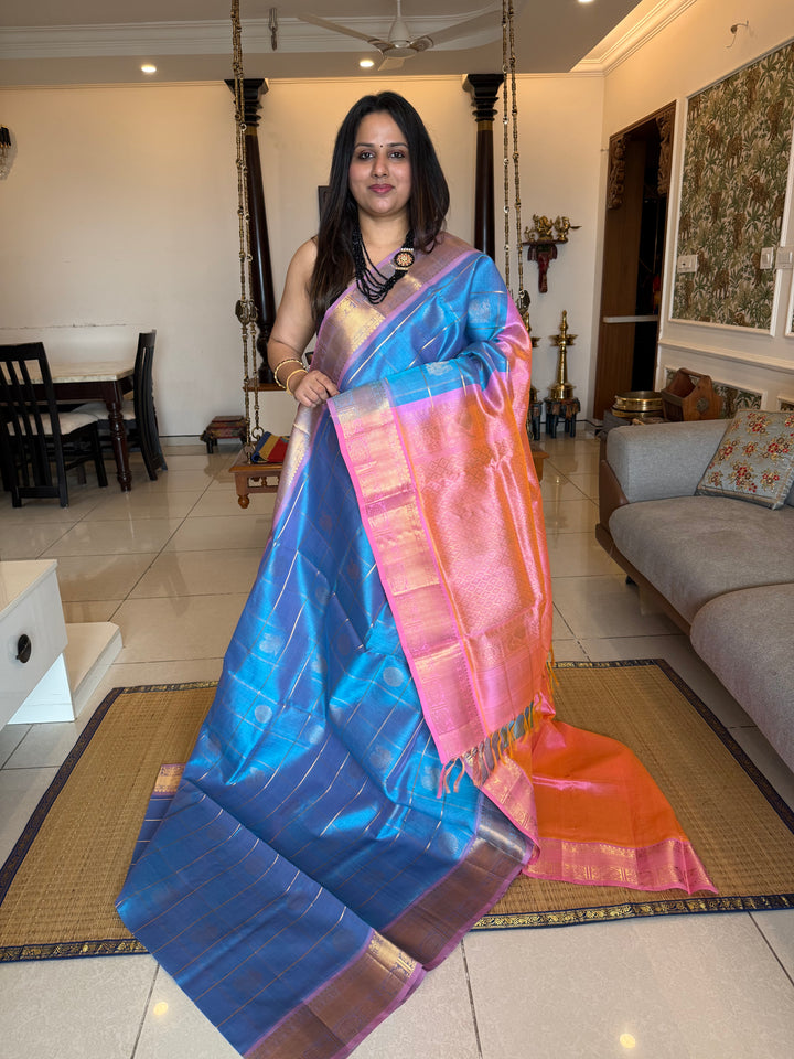 Pastel Blue with Baby Pink colour , zari kattam in the body with Mayil and Chakram butta ,traditional borders and rich Pallu Silk Cotton Saree