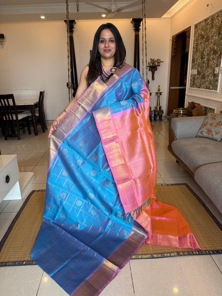Pastel Blue with Baby Pink colour , zari kattam in the body with Mayil and Chakram butta ,traditional borders and rich Pallu Silk Cotton Saree
