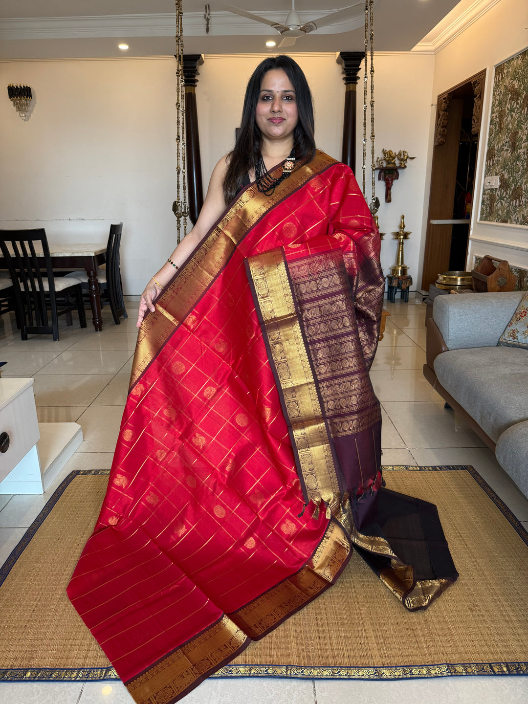 Red With  Brown  , zari kattam in the body with Mayil and Chakram butta ,traditional borders and rich Pallu Silk Cotton Saree