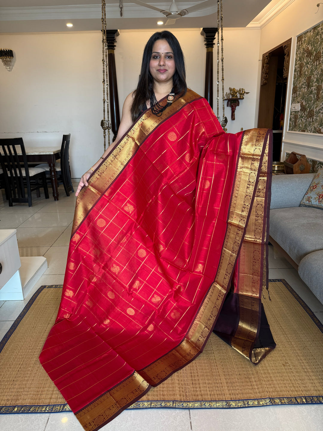Red With  Brown  , zari kattam in the body with Mayil and Chakram butta ,traditional borders and rich Pallu Silk Cotton Saree