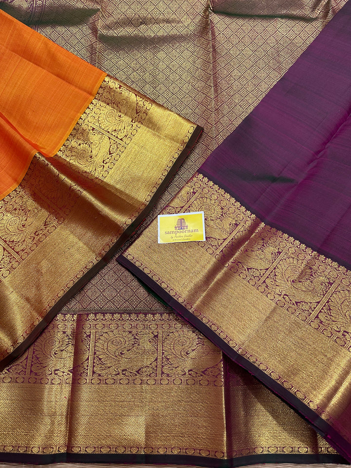 Orange with Greenish Purple Rich Zari Butta , Rich Border and Pallu Pure Kanjivaram Silk Saree