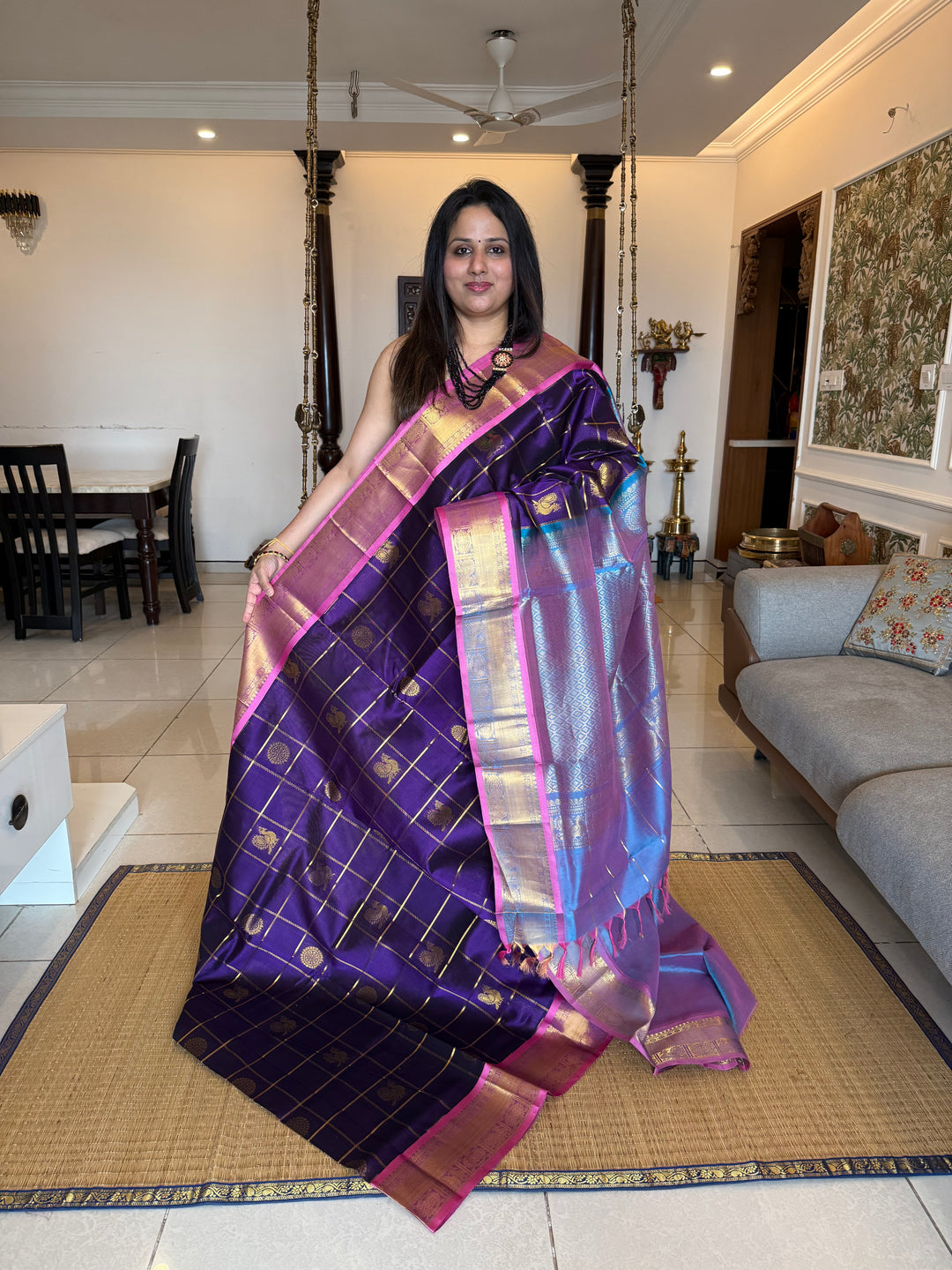 Purple with Blueish Pink colour ,Baby Pink selvedge ,zari kattam in the body with Mayil and Chakram butta ,traditional borders and rich Pallu Silk Cotton Saree