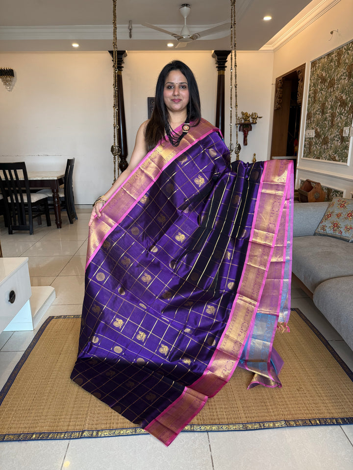 Purple with Blueish Pink colour ,Baby Pink selvedge ,zari kattam in the body with Mayil and Chakram butta ,traditional borders and rich Pallu Silk Cotton Saree
