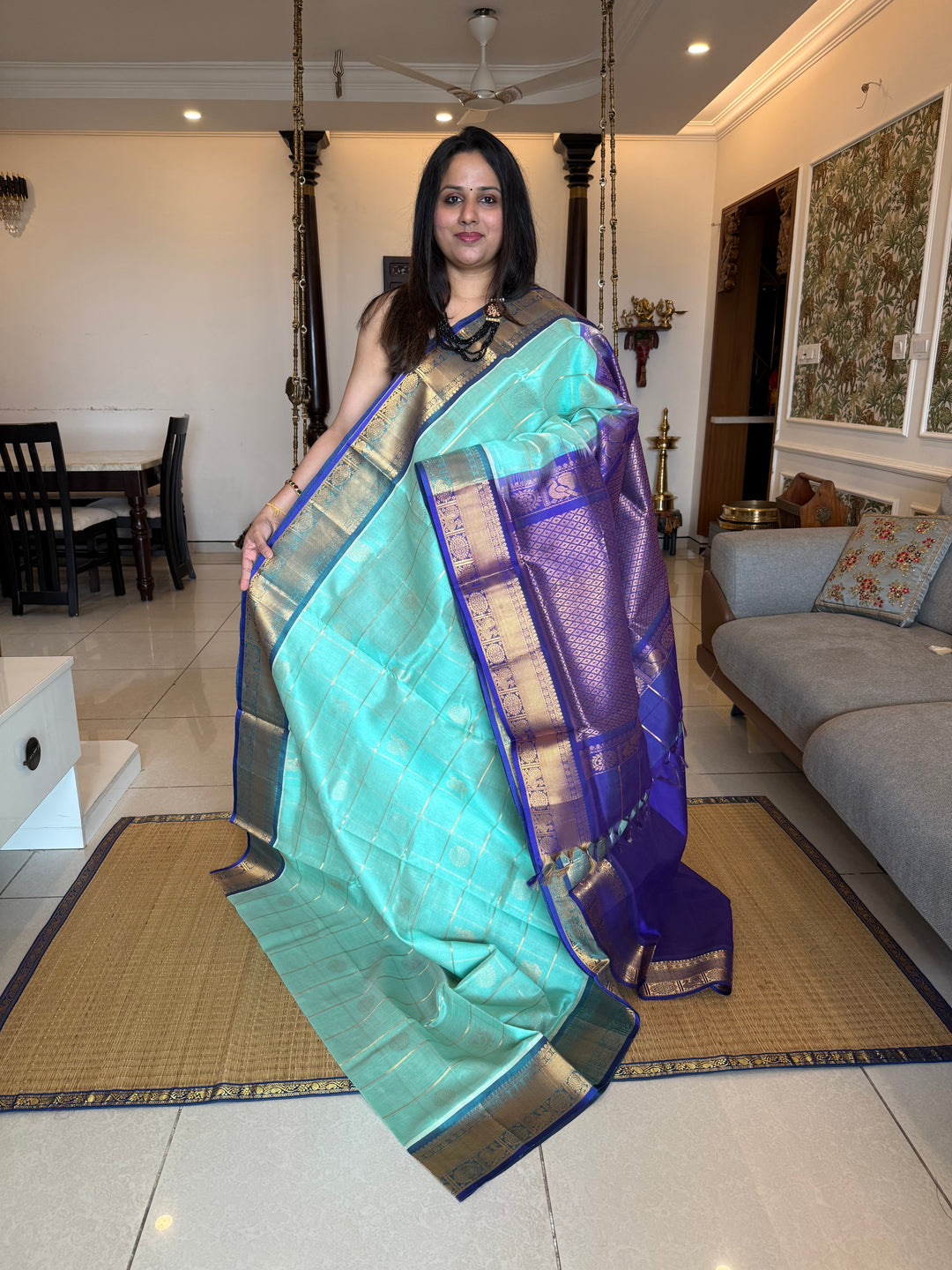 Light Blue with Dark Blue  , zari kattam in the body with Mayil and Chakram butta ,traditional borders and rich Pallu Silk Cotton Saree