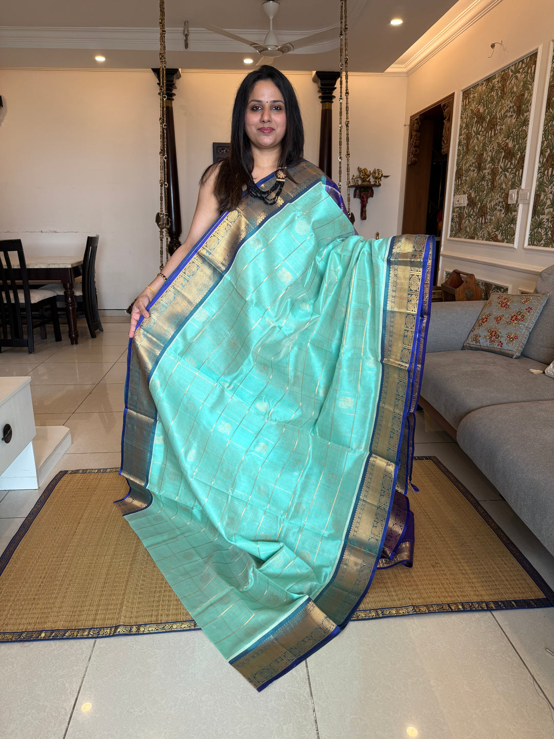 Light Blue with Dark Blue  , zari kattam in the body with Mayil and Chakram butta ,traditional borders and rich Pallu Silk Cotton Saree