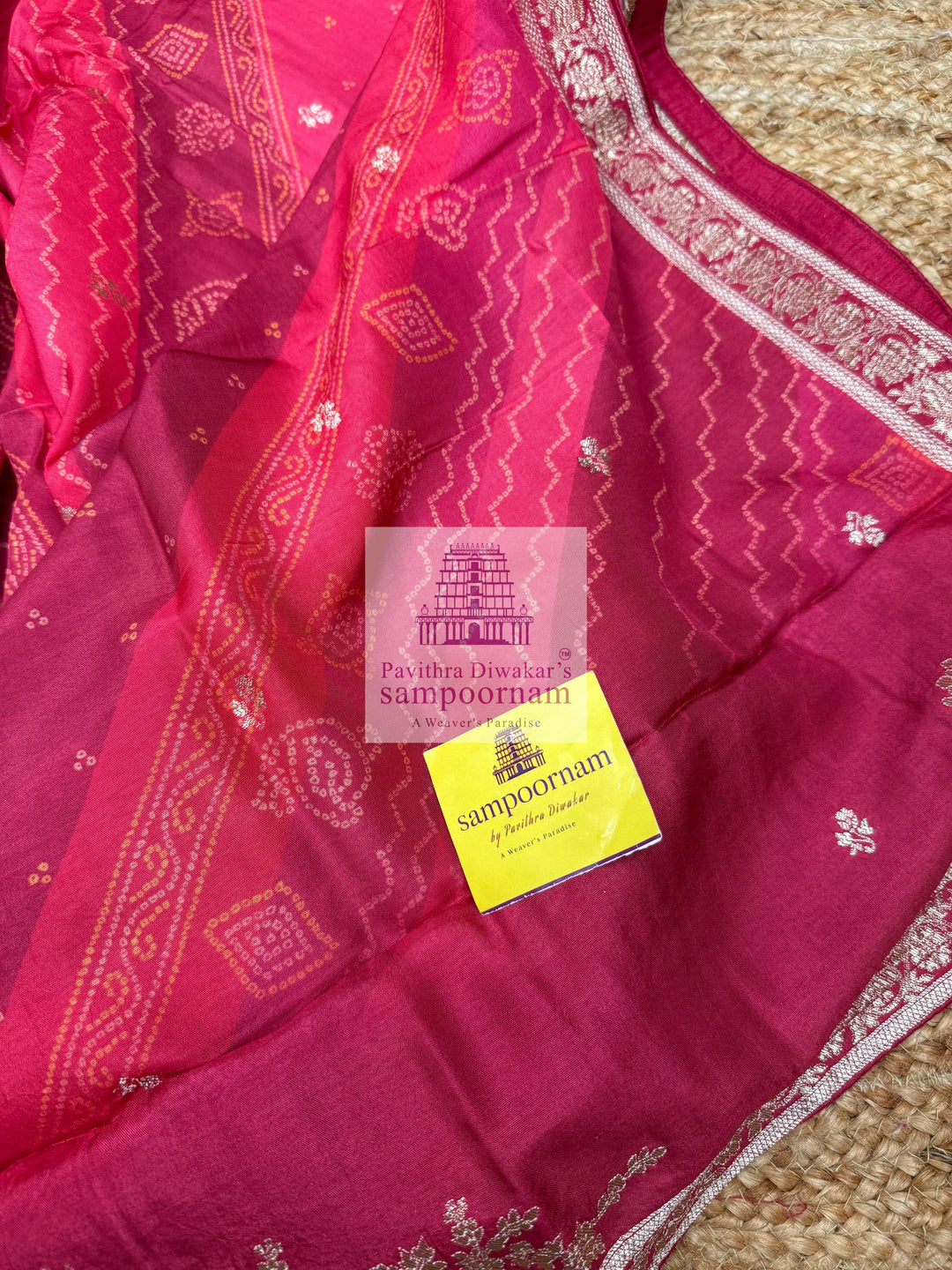 Red Semi Banarasi Silk printed top with rich Embroidery in the Yoke and a Heavy Designer Dupatta with Tassels and Plain Bottom