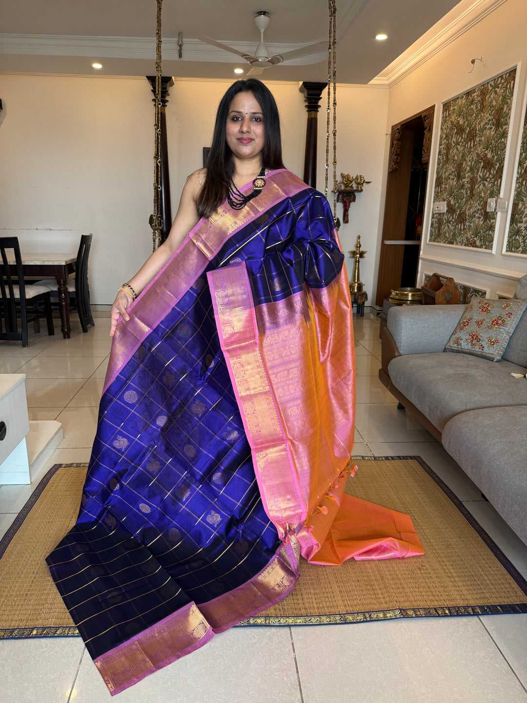 Blue with Baby Pink  , zari kattam in the body with Mayil and Chakram butta ,traditional borders and rich Pallu Silk Cotton Saree