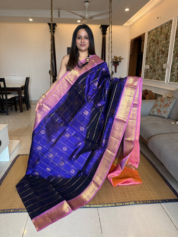 Blue with Baby Pink  , zari kattam in the body with Mayil and Chakram butta ,traditional borders and rich Pallu Silk Cotton Saree