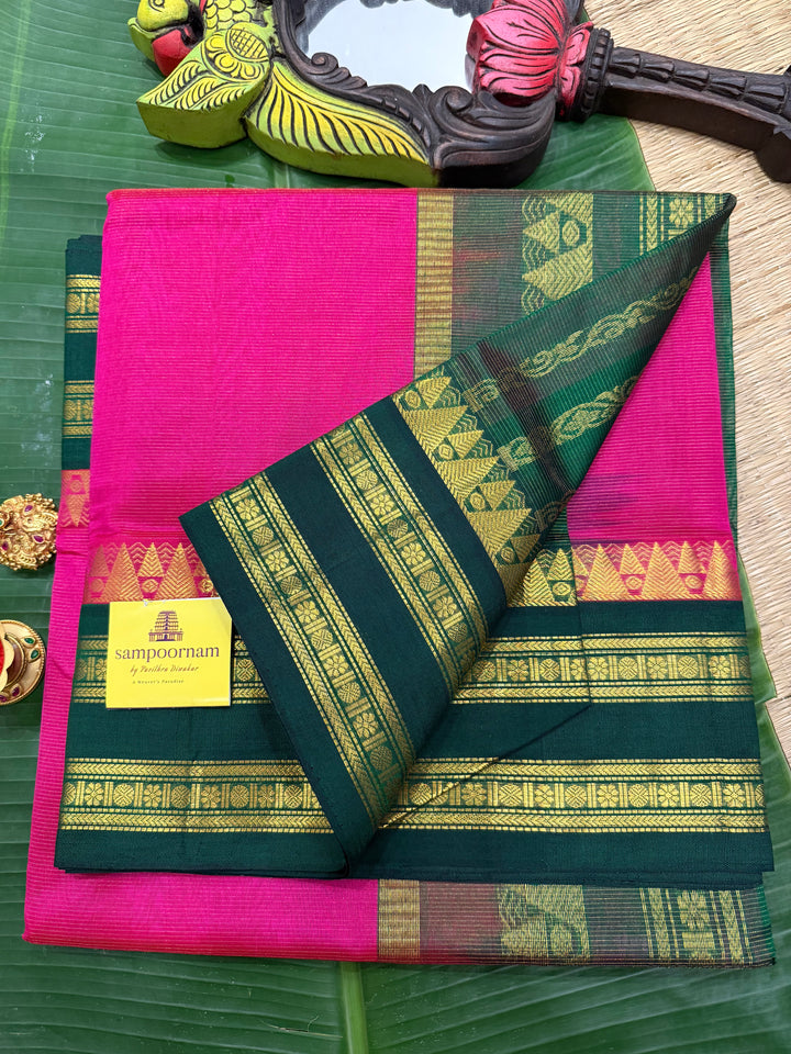 Magenta with Green , Vairaoosi lines in the body , ,traditional borders and rich Pallu korvai Silk Cotton Saree