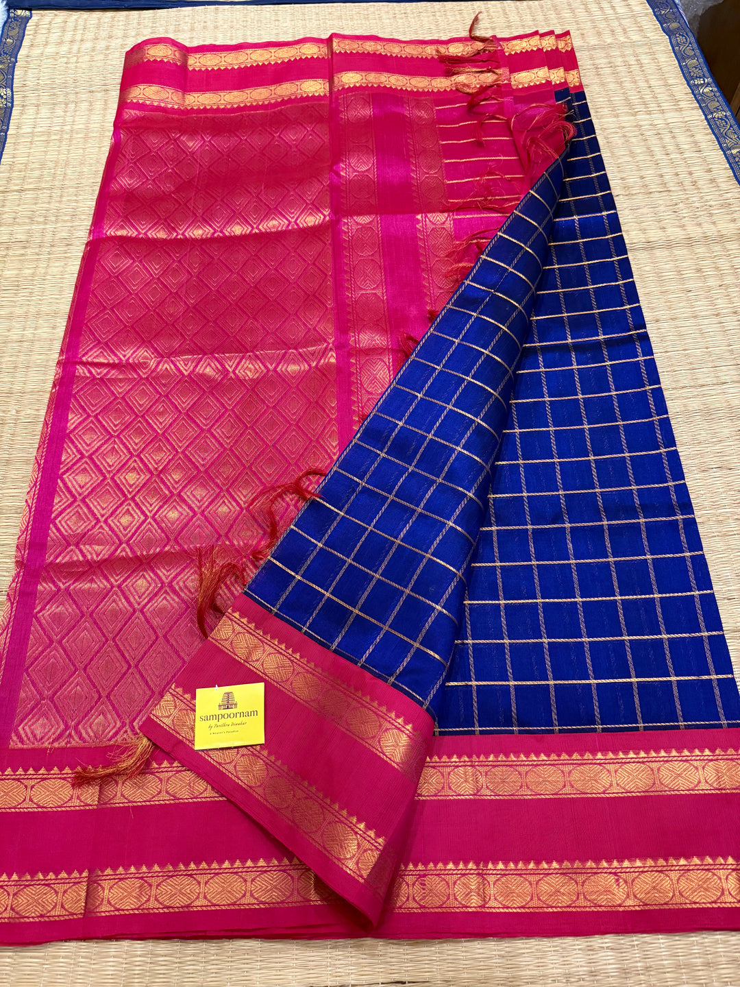 Blue with Pink , zari checks in the body , rettepet border and rich Pallu Korvai Silk Cotton Saree