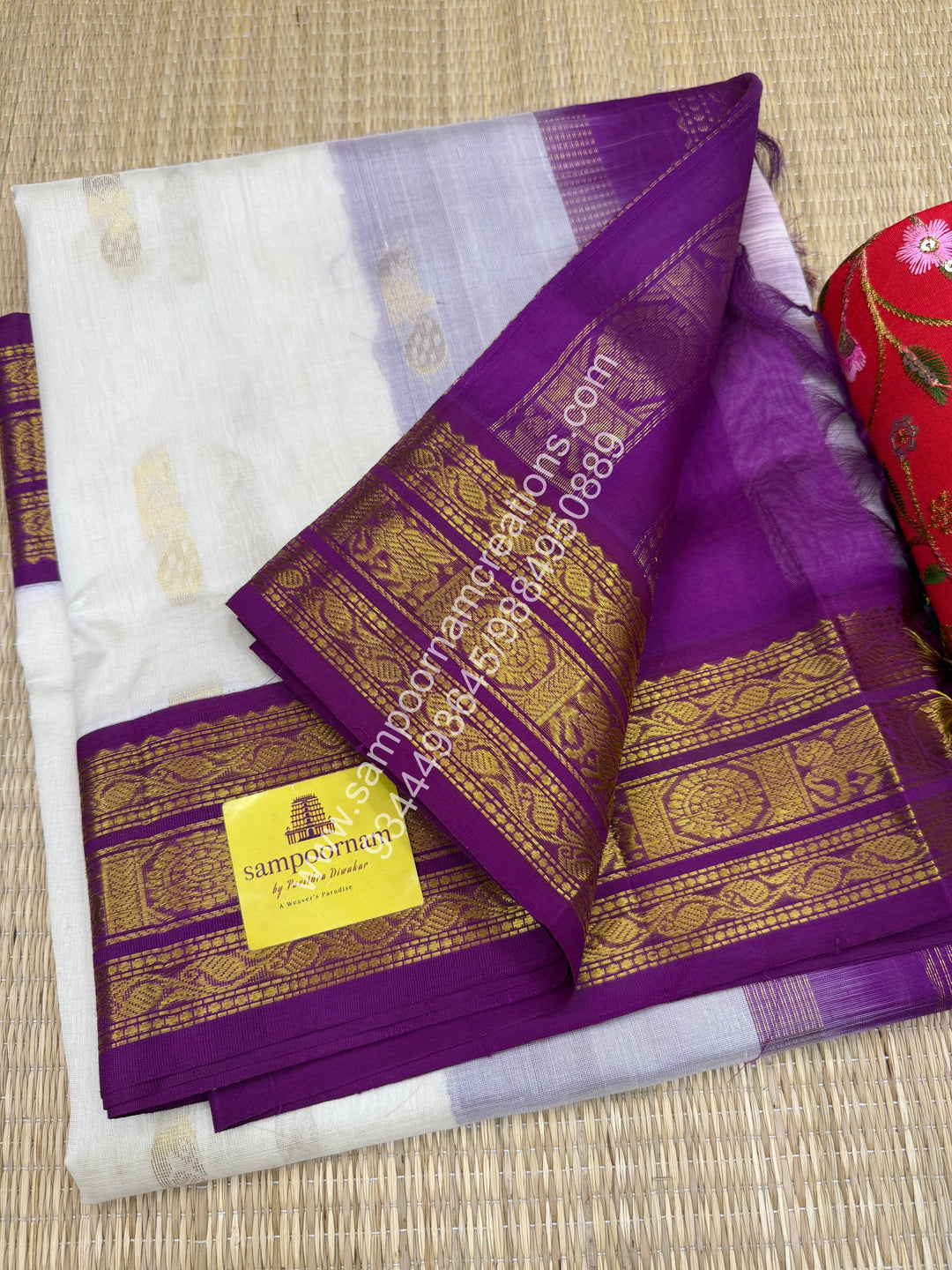 Offwhite with Dark Magenta , Mayil Zari butta in the body , traditional border and Grand Pallu Korvai Silk Cotton Saree