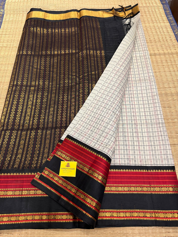 White with Black Lakshadeepam thread pattern in the body with traditional borders and rich Pallu Korvai Silk Cotton Saree