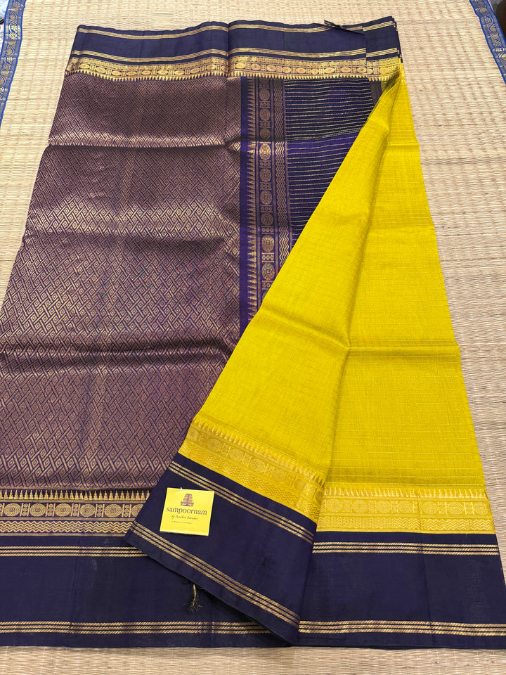 Lemon Yellow with Dark Blue , zari kattam in the body ,rettapet border and rich Pallu Korvai Silk Cotton Saree