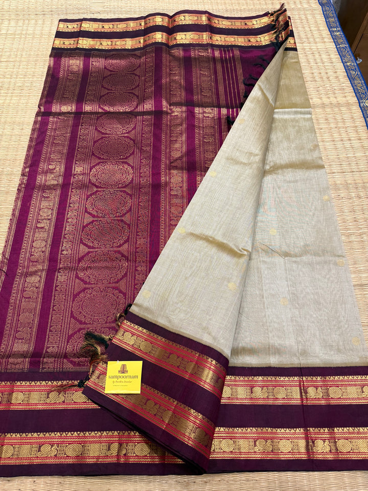 Light Gold  ,rich zari butta in the body , Kanchi rich border and traditional Pallu Korvai Silk Cotton SareeGold with Dark Maroon