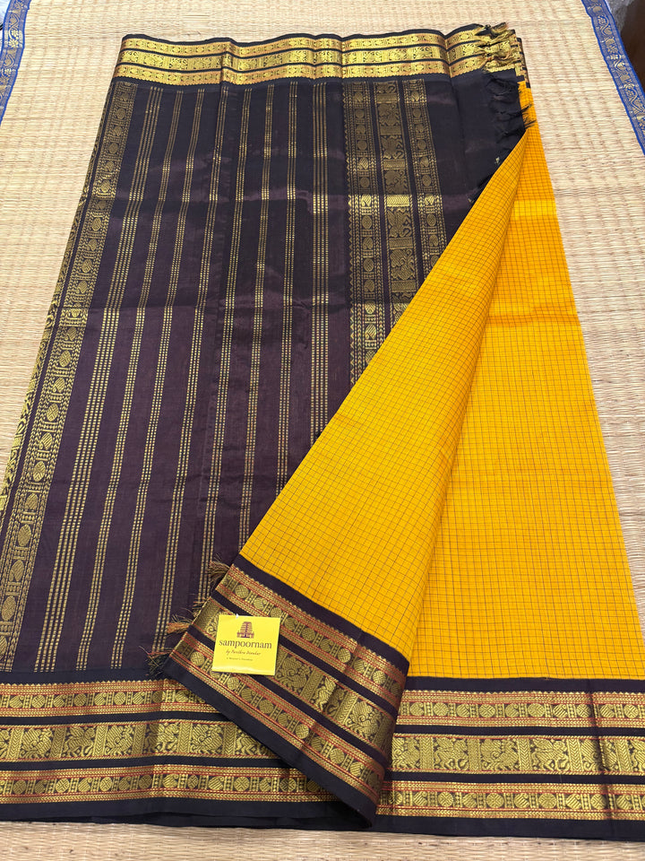 Mambazha Manjal with Brown , Podi Kattam in the body ,rich kanchi border and traditionl pallu Korvai Silk Cotton Saree