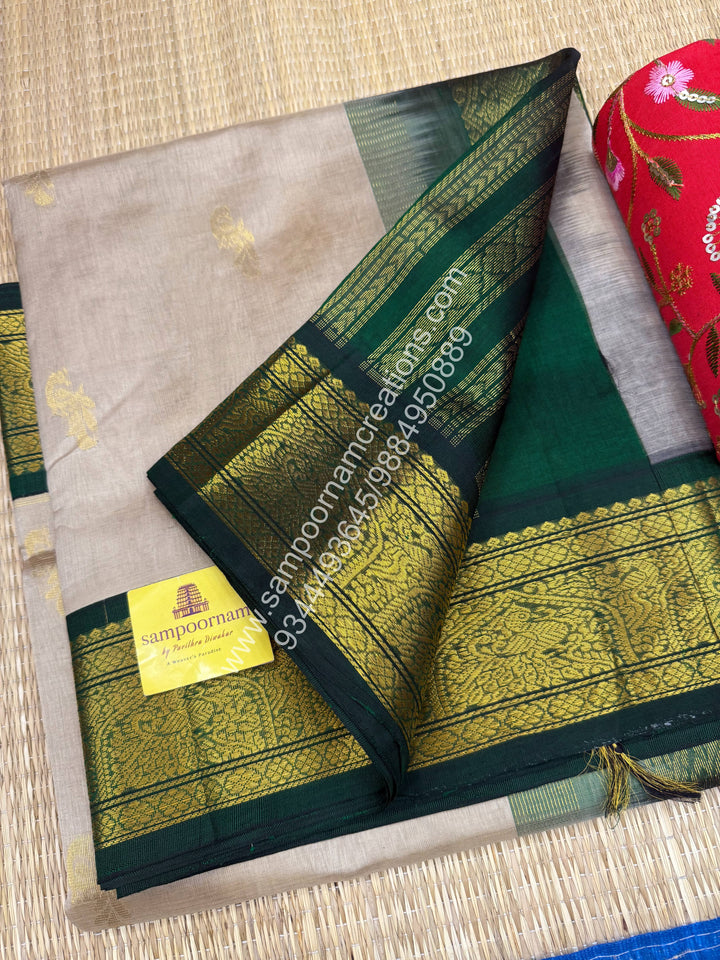 Beige with Dark Green , rich Mayil Zari butta in the body and traditional borders , Grand Pallu Korvai Silk Cotton Saree