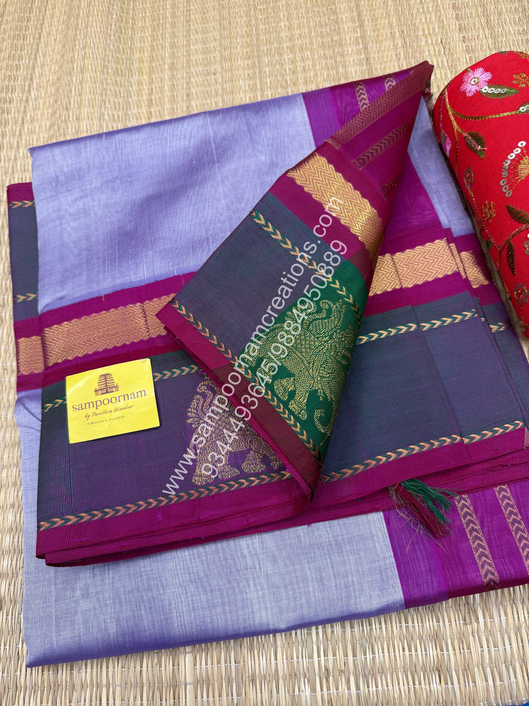 Lavender with Magenta  , Elephant motifs in the borders and Traditonal  Pallu Korvai Silk Cotton Saree