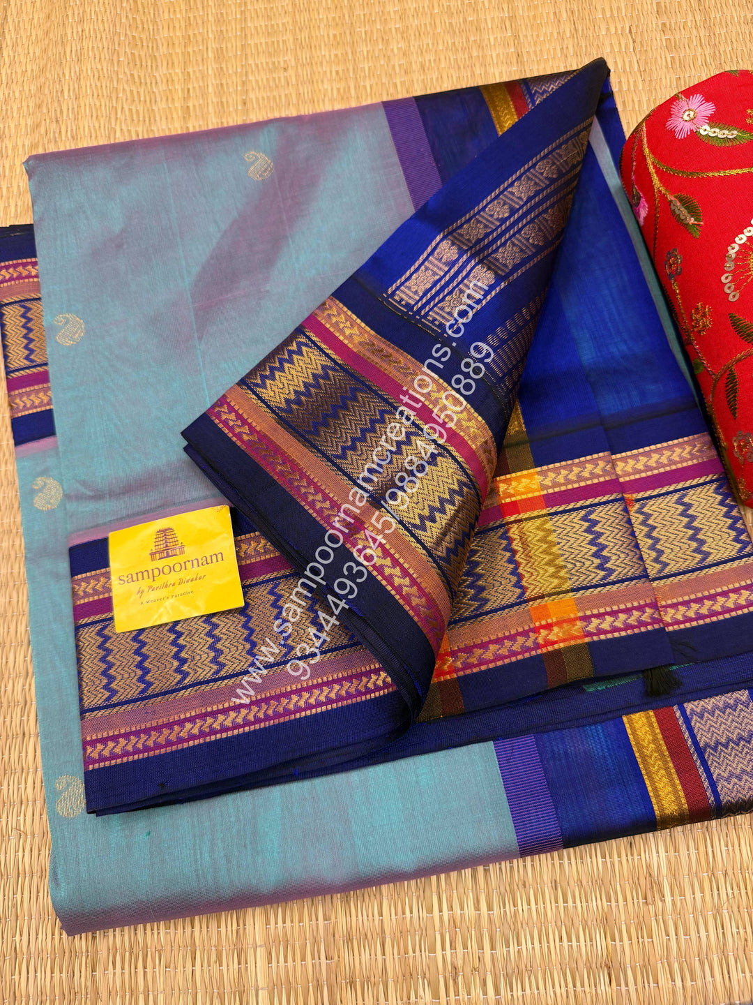 Pinkish  Grey with Blue , Rich Mango Zari butta in the body , Traditional borders and Grand Pallu Korvai Silk Cotton Saree