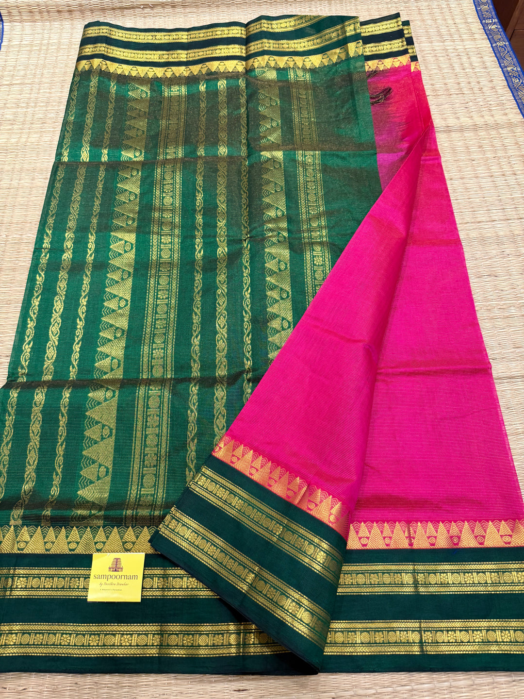 Magenta with Green , Vairaoosi lines in the body , ,traditional borders and rich Pallu korvai Silk Cotton Saree
