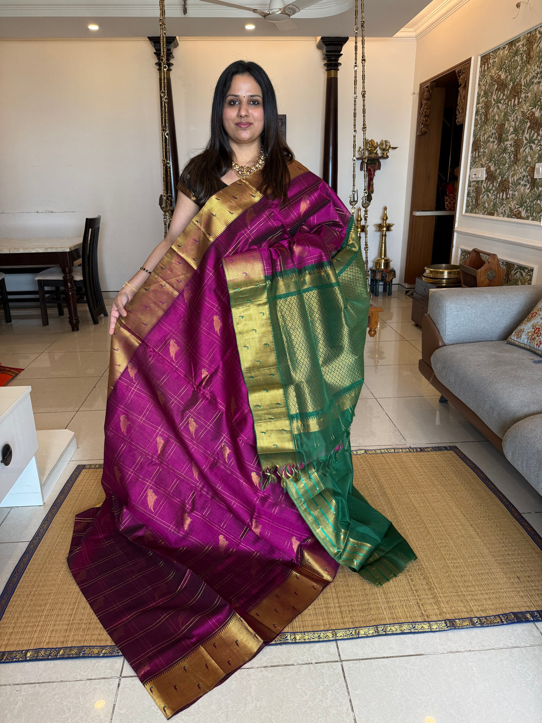 Purple with Dark Green , zari body checks with Parrot Motifs in the body , traditional Paithani borders and rich Pallu Silk Cotton Saree
