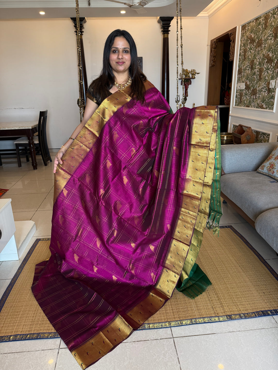 Purple with Dark Green , zari body checks with Parrot Motifs in the body , traditional Paithani borders and rich Pallu Silk Cotton Saree