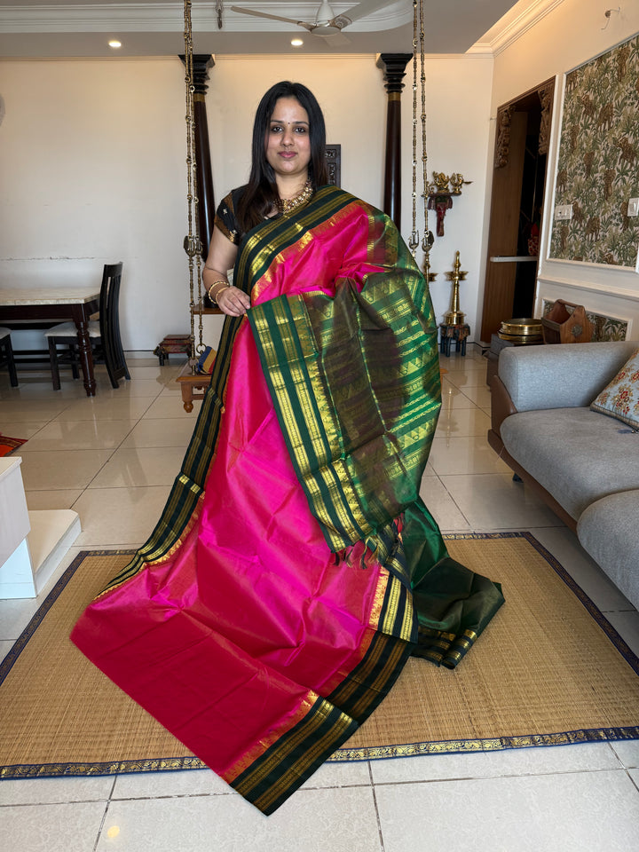 Magenta with Green , Vairaoosi lines in the body , ,traditional borders and rich Pallu korvai Silk Cotton Saree