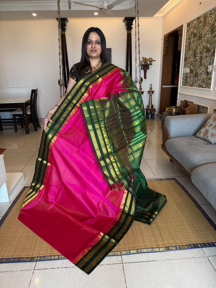 Magenta with Green , Vairaoosi lines in the body , ,traditional borders and rich Pallu korvai Silk Cotton Saree