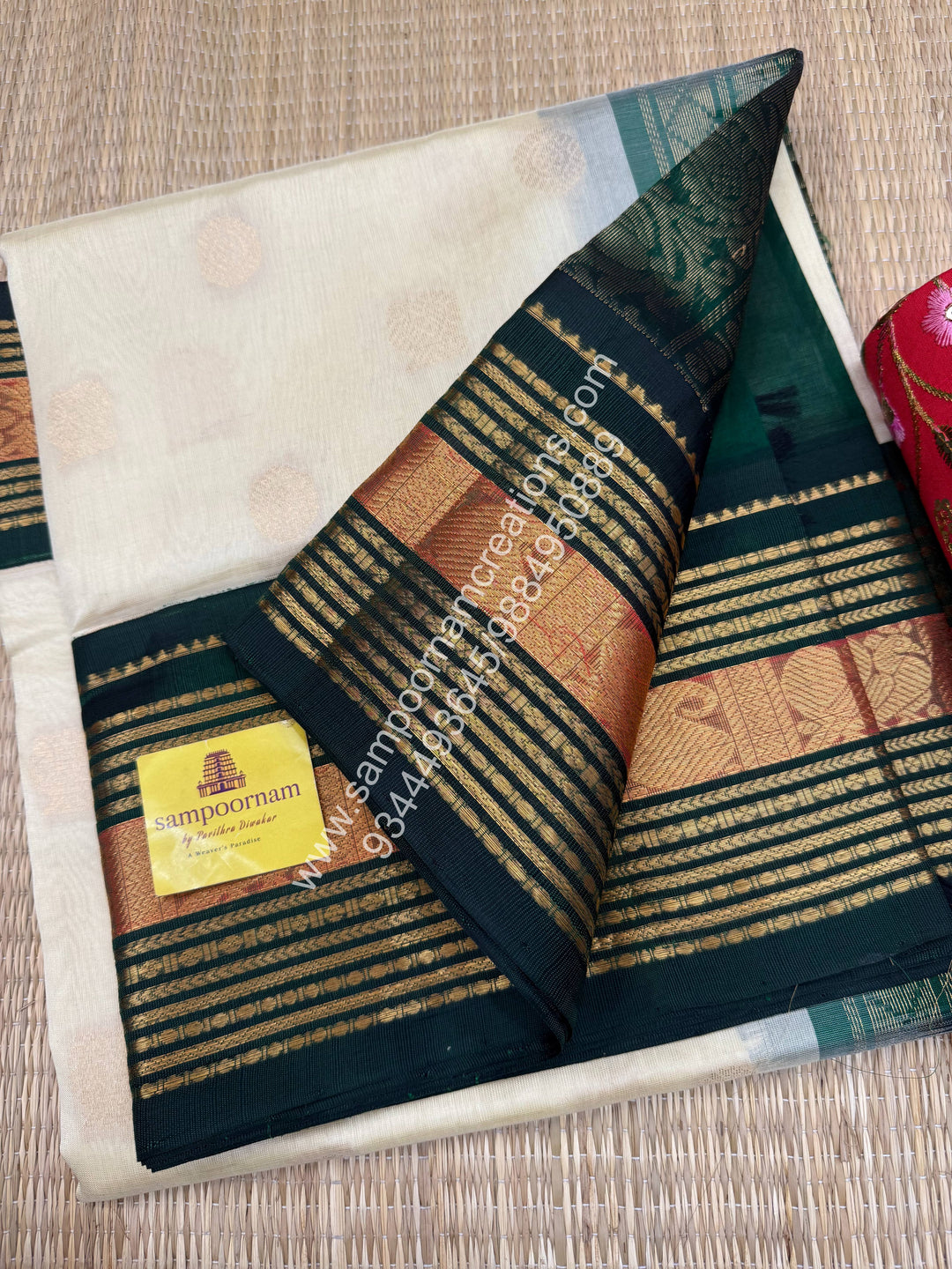 Cream with Dark Green  , Annam and Chakram Zari butta in the body , Rich Kanchi border , Grand Pallu Korvai Silk Cotton Saree , Annam and Chakram Zari butta in the body , Rich Kanchi border , Grand Pallu Korvai Silk Cotton Saree