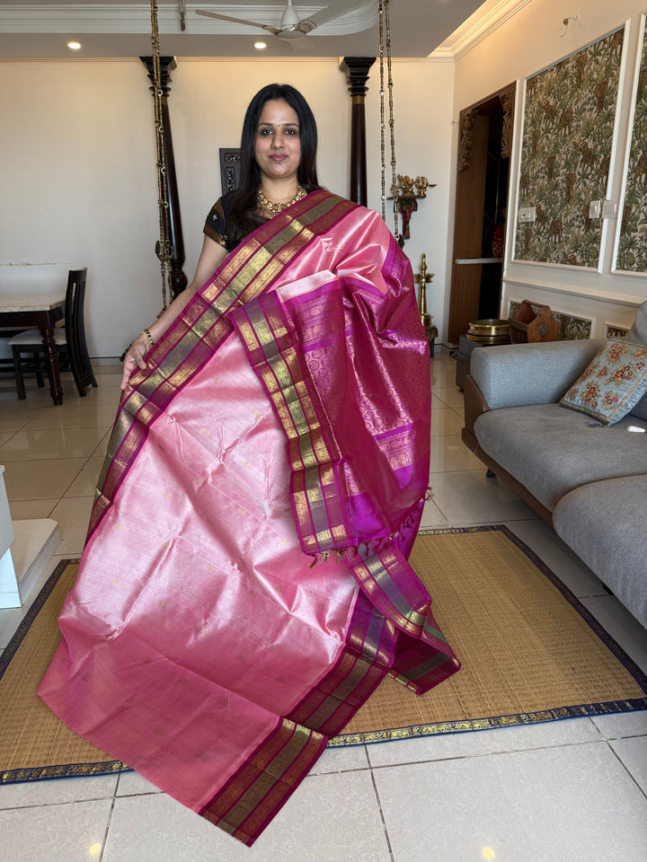 Onion Pink with Magenta , zari butta in the body , Kanchi rich border and traditional Pallu Korvai Silk Cotton Saree