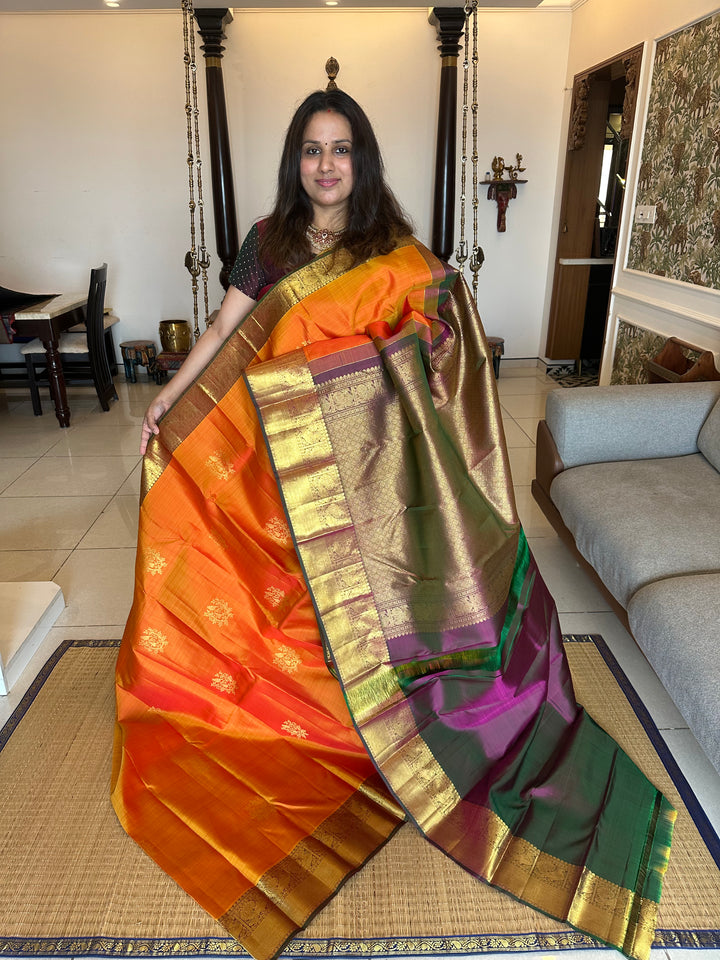 Orange with Greenish Purple Rich Zari Butta , Rich Border and Pallu Pure Kanjivaram Silk Saree