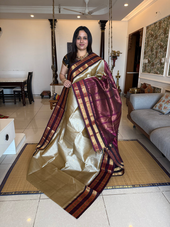 Light Gold  ,rich zari butta in the body , Kanchi rich border and traditional Pallu Korvai Silk Cotton SareeGold with Dark Maroon